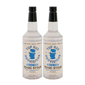 Top Hat Provisions tonic syrup bottle being poured for zero-calorie gin and tonic.