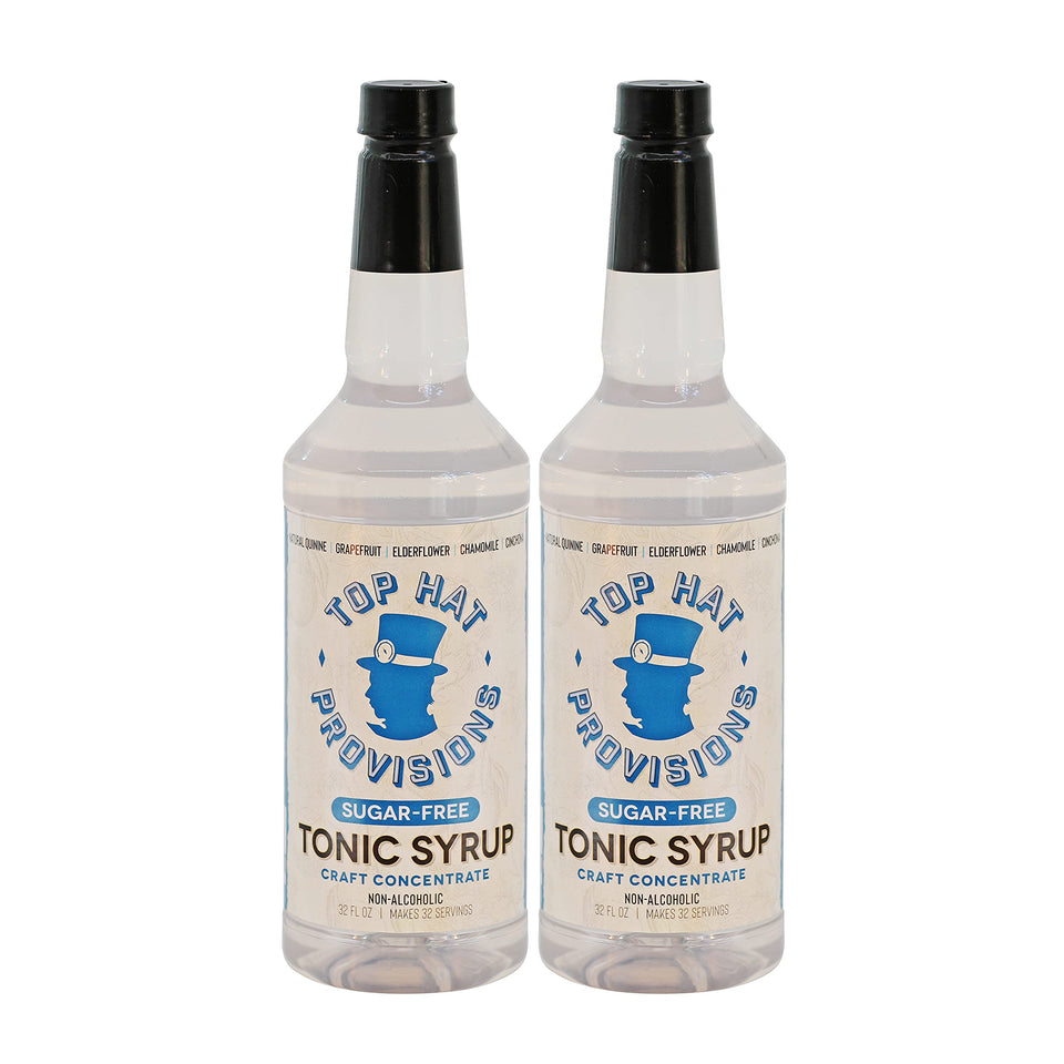 Top Hat Provisions tonic syrup bottle being poured for zero-calorie gin and tonic.