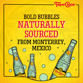 Glass poured Topo Chico Sabores Tropical Mango showing refreshing effervescence