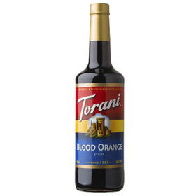 Torani Blood Orange Syrup bottle on the counter adds bold citrus flavor to beverages