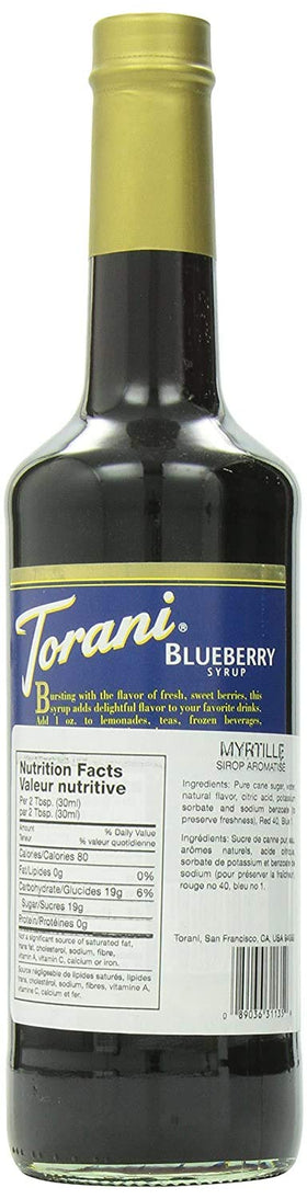 Torani Blueberry Syrup being poured into a glass to elevate drinks.