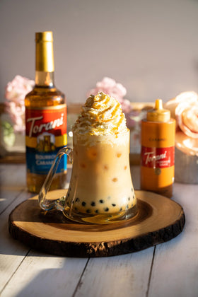 Torani Bourbon Caramel Syrup pour over dessert drizzle for decadence.