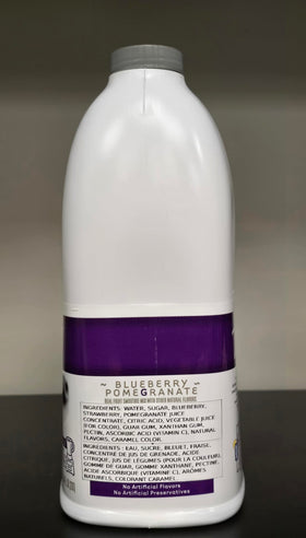 Torani bottle on kitchen shelf showcasing heritage for home cafe creations