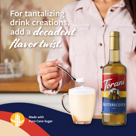 Glass bottle of Torani Butterscotch Syrup with BPA-free pump close-up.