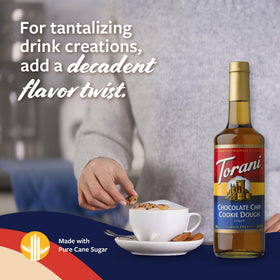 Torani cookie dough syrup label highlighting premium flavor on glass bottle.