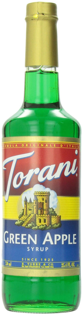 Torani Green Apple Syrup bottle pouring into a glass for bright drinks