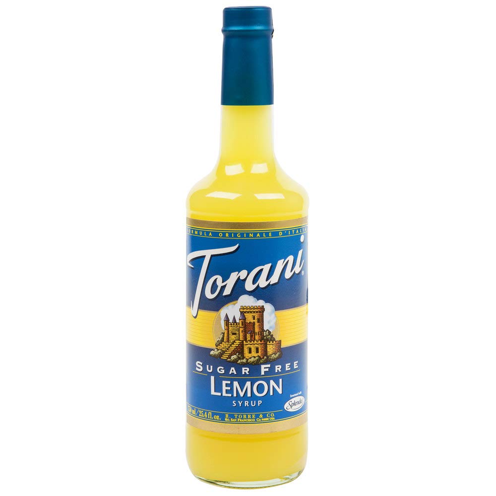 Torani Lemon Syrup Sugar Free bottle enhances citrus flavor in coffee and tea without sugar.