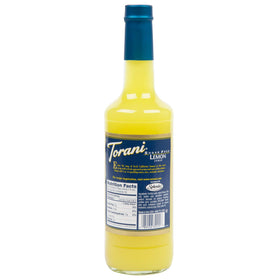 Torani Lemon Syrup Sugar Free pour showcases sugar-free lemon flavor for iced beverages.