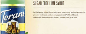 Torani Lime Syrup with sparkling water shows citrus flavor in a glass.