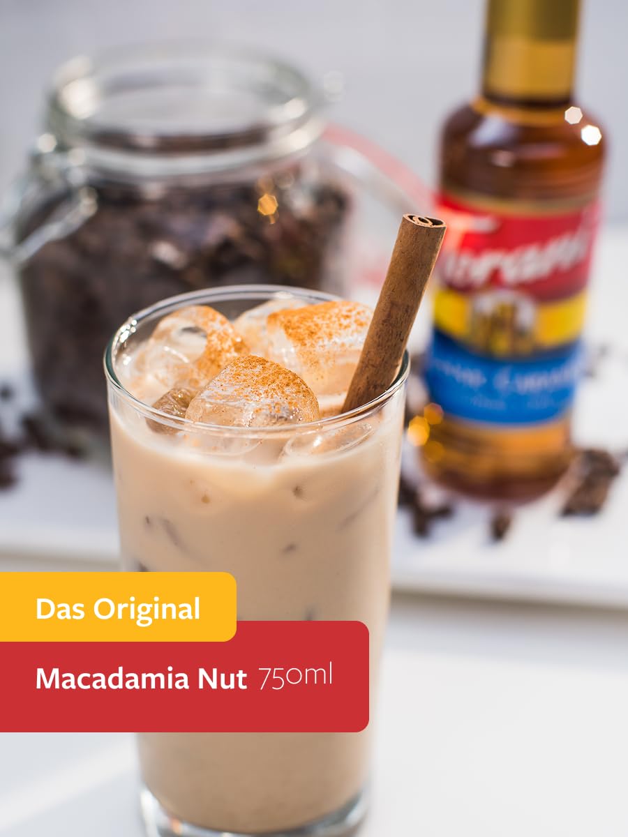 Torani Macadamia Nut Syrup being poured over coffee for a creamy latte.