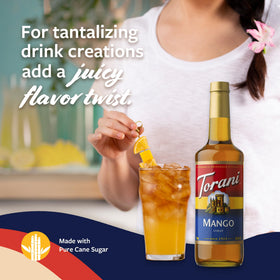 Torani Mango Syrup pour spout highlighting vibrant beverage color.