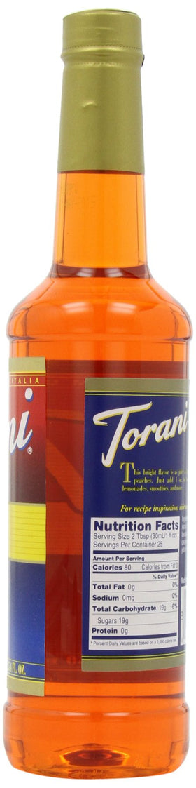 Torani peach syrup close-up, highlighting vibrant color for beverages.