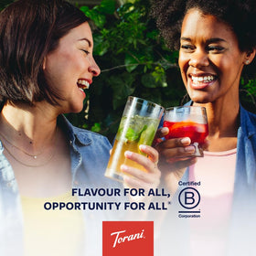 Torani Peach Syrup with coffee cup hints at versatile flavoring for drinks.