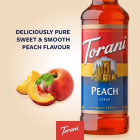 Torani Peach Syrup label close-up highlights natural flavors and cane sugar.