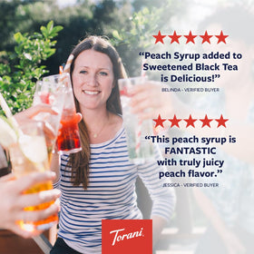 Torani Peach Syrup pour into a glass demonstrates peach flavor in iced tea.