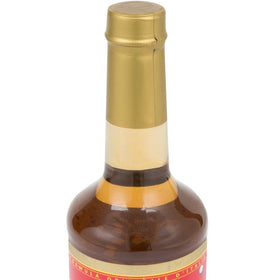 Torani Peanut Butter Syrup label close-up with branding and usage notes.
