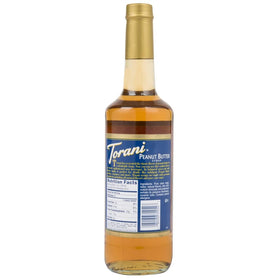 Torani Peanut Butter Syrup pour captured midair, ideal for quick flavoring in shakes.