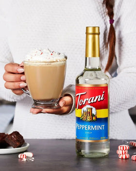 Torani Peppermint Syrup beside a latte to inspire cafe-style drinks at home