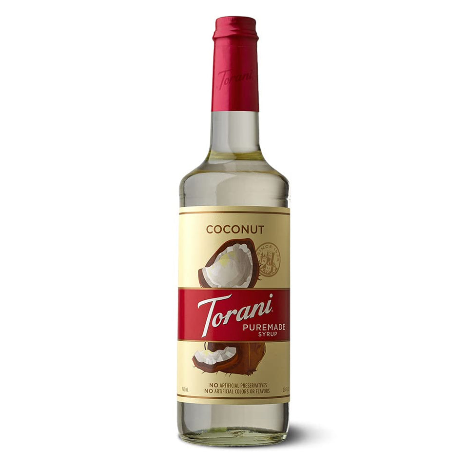 Torani Puremade Coconut Syrup bottle on kitchen shelf, ideal for tropical beverages