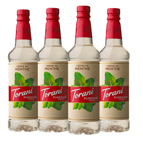 Torani Puremade Creme De Menthe syrup bottle pouring for minty beverages.