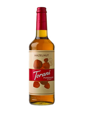 Torani Puremade Hazelnut Syrup bottle on counter for coffee flavoring