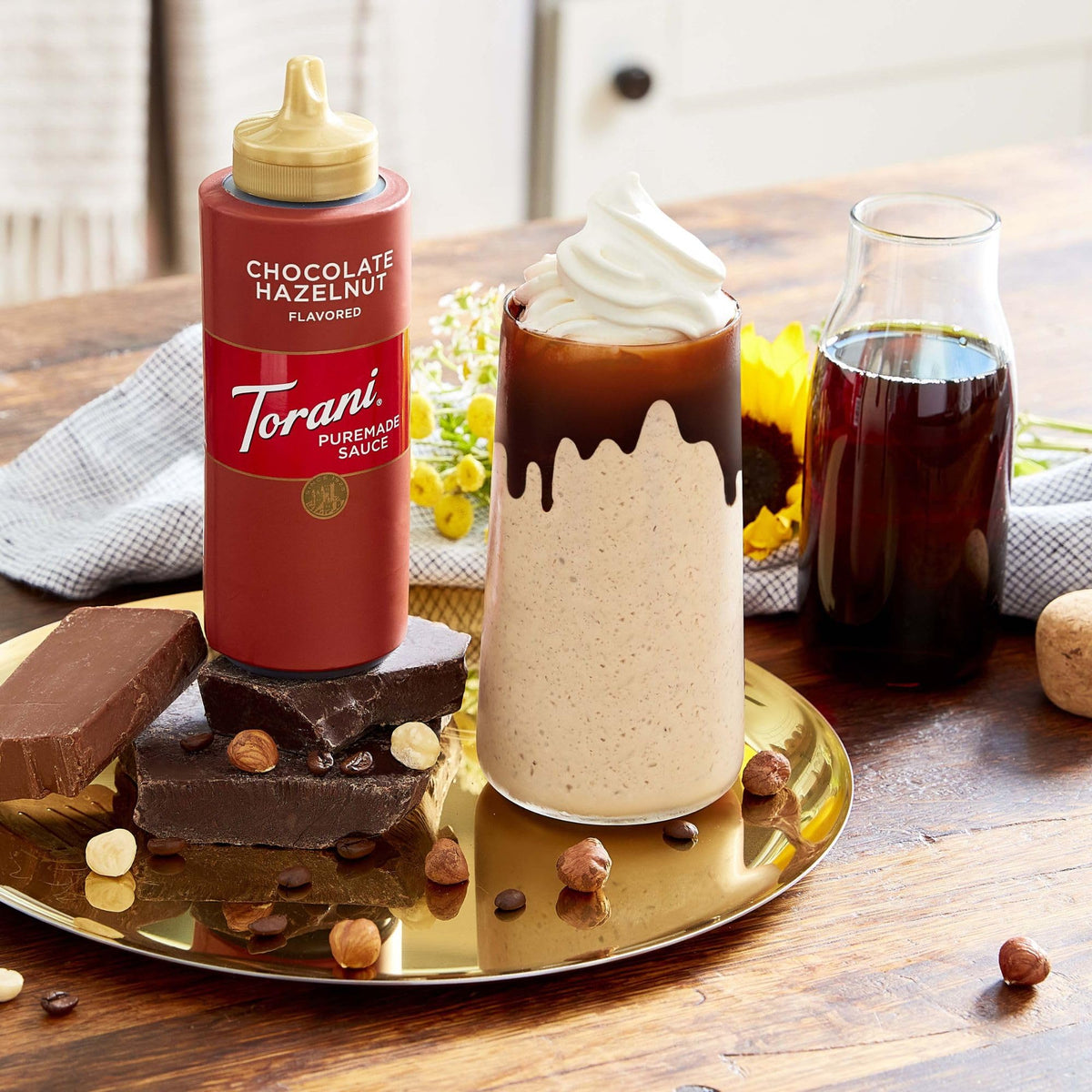 Torani sauce with a dispensing spout for easy pouring.