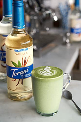 Close-up on Torani Vanilla label showing zero sugar formula and natural flavors.