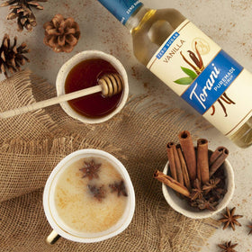 Frothy coffee with Torani Salted Caramel drizzle from Zero Sugar syrup.