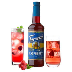 Torani Raspberry Sugar Free Syrup poured into a glass for a refreshing mocktail.