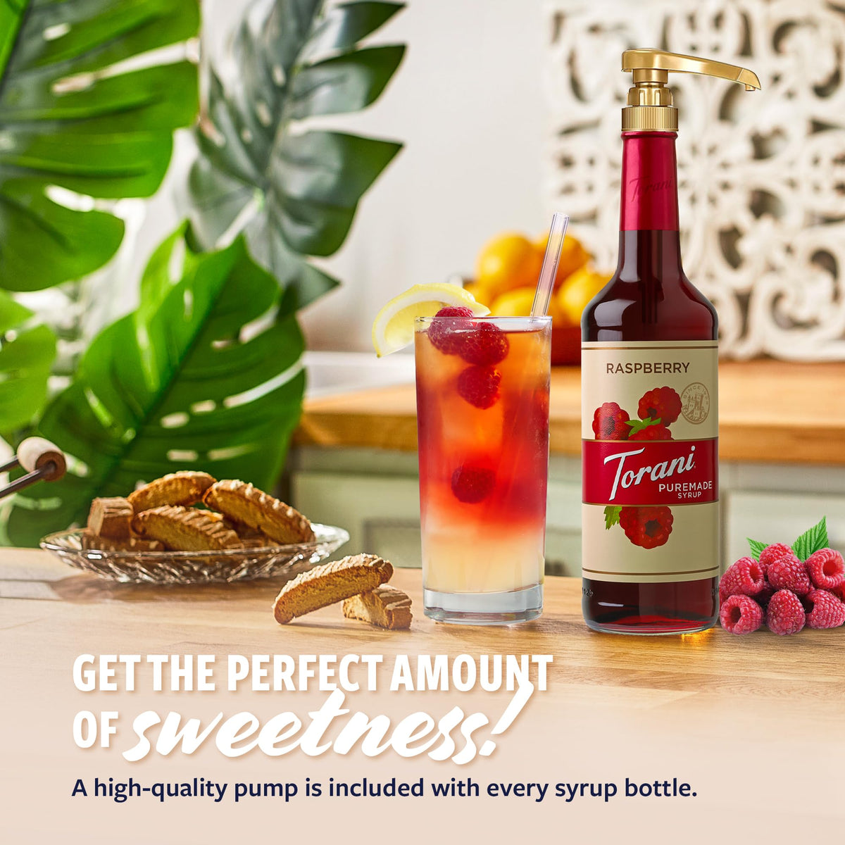 Torani Raspberry Syrup pour demonstrates vibrant raspberry color.