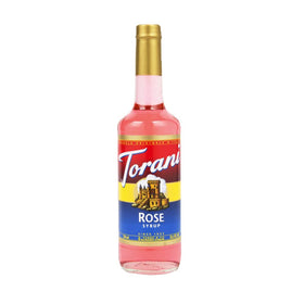 Torani Rose Syrup bottle on counter ready to elevate beverages with floral notes.