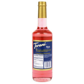 Close-up of Torani Rose Syrup label on premium glass bottle.