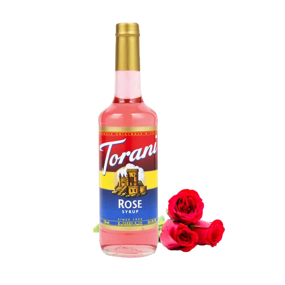 Pouring Torani Rose Syrup for a floral latte infusion.