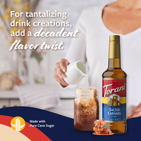 Pouring Torani Salted Caramel syrup into a cup for cafe-style drinks.