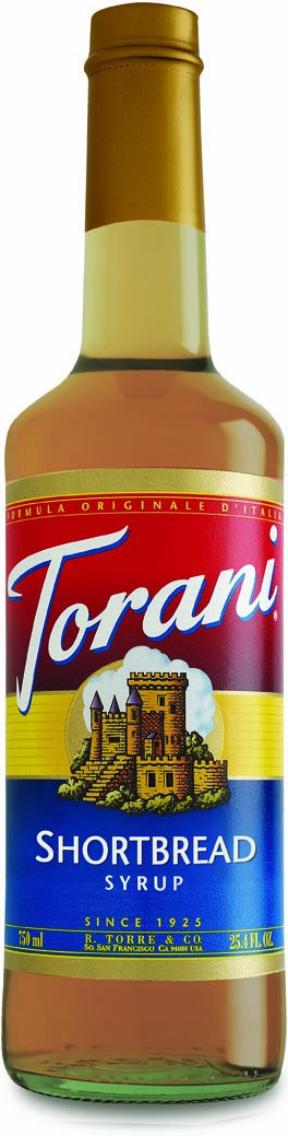 Torani Shortbread Syrup bottle pour for cozy lattes and baked treats.