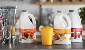 Torani Smoothie Mix poured over ice for quick tropical drinks