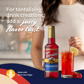 Torani Strawberry Syrup Lemonade pitcher infused with fruit