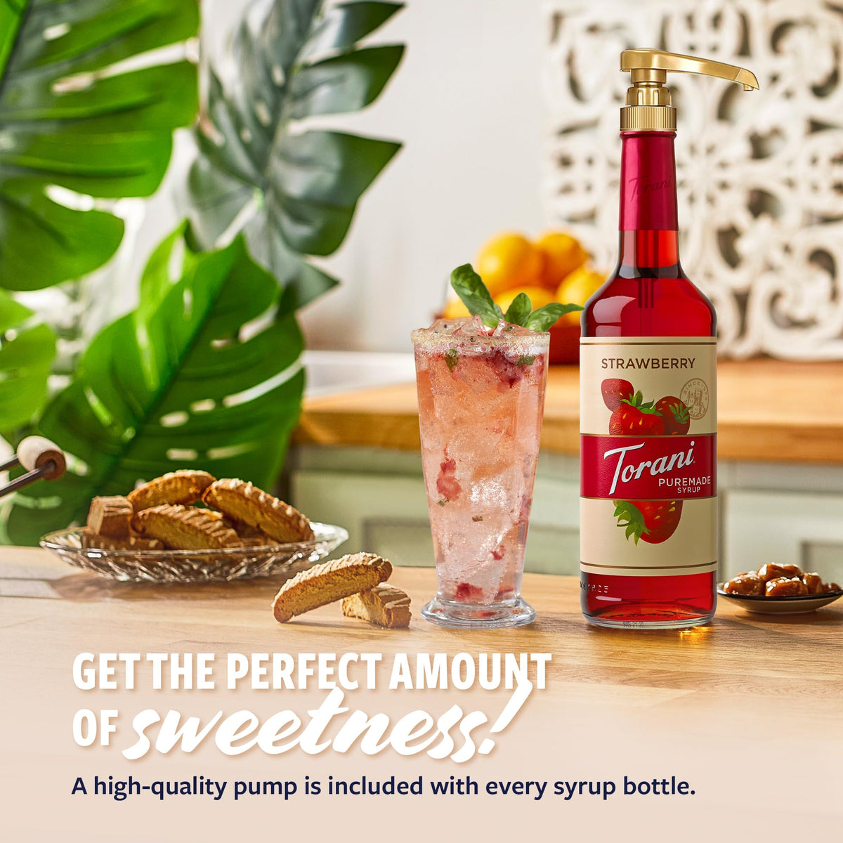 Pouring Torani strawberry syrup into a glass for vibrant flavor