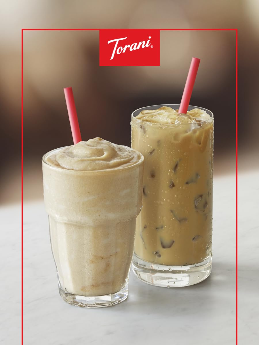 Cafe scene with Torani syrup ready to flavor cappuccinos