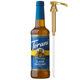Torani Sugar-Free Classic Hazelnut syrup bottle pouring for rich coffee flavor.