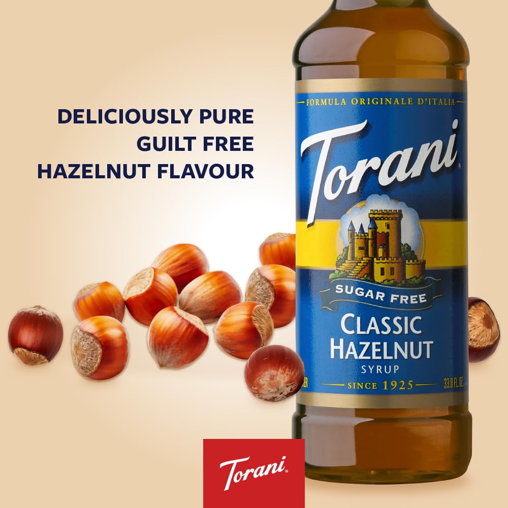 Torani Sugar Free Classic Hazelnut syrup being poured into a latte
