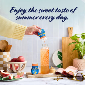 Travel-friendly Torani peach bottle for cocktails and lemonade