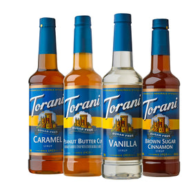 Torani Sugar Free Peanut Butter Cup bottle pouring over ice for a rich sugar-free latte