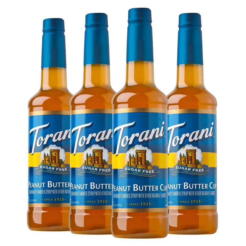 Torani Sugar Free Peanut Butter Cup bottle pouring into a cup for flavorful beverages