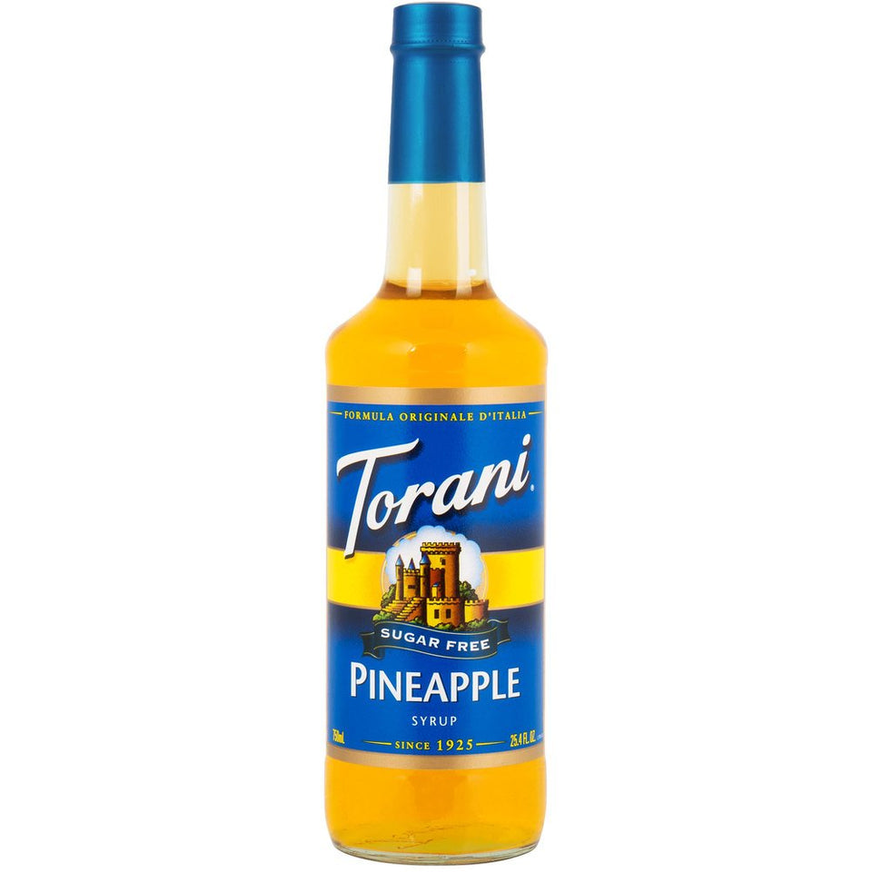 Torani Sugar-Free Pineapple Syrup bottle on a bar with tropical flavor and no added sugar