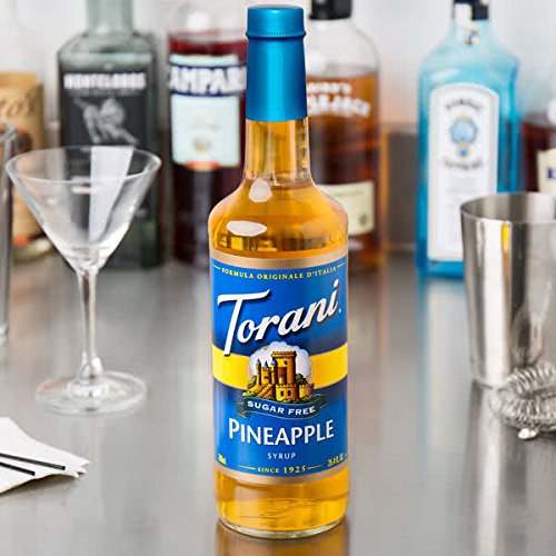 Torani Sugar-Free Pineapple Syrup being poured for a pineapple-forward, low-sugar drink