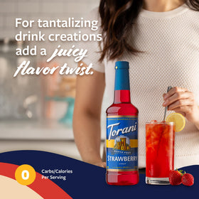 Torani Sugar Free Strawberry Syrup poured into a mocktail with a bright hue.