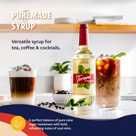 Cafe counter with Torani bottle ready to customize drinks.