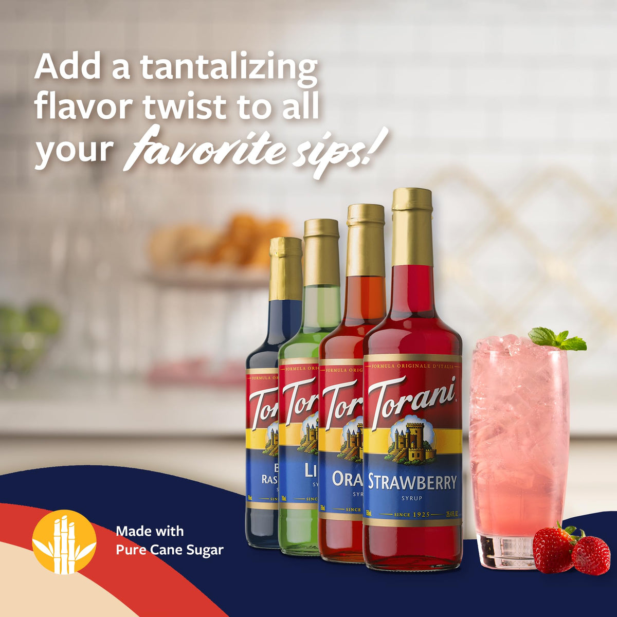 Torani Orange syrup bottle and glass for bright beverages.