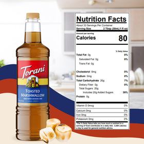 Torani Syrup bottle shown in café setup for professional-quality drinks.